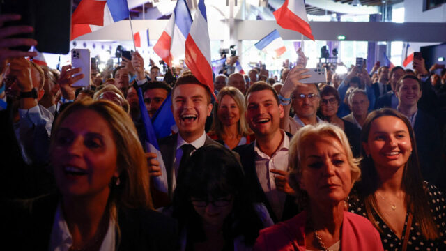 Macron calls shock French elections after far-right rout by Le Pen