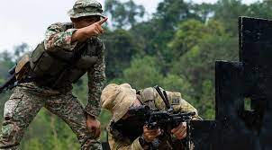 Aussie troops train in the Malaysian jungle