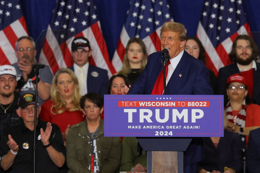 Sign at Trump rally encourages mail-in ballots, despite him saying they shouldn’t be allowed