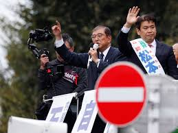 Japan election: Polls open with ruling LDP facing tight race