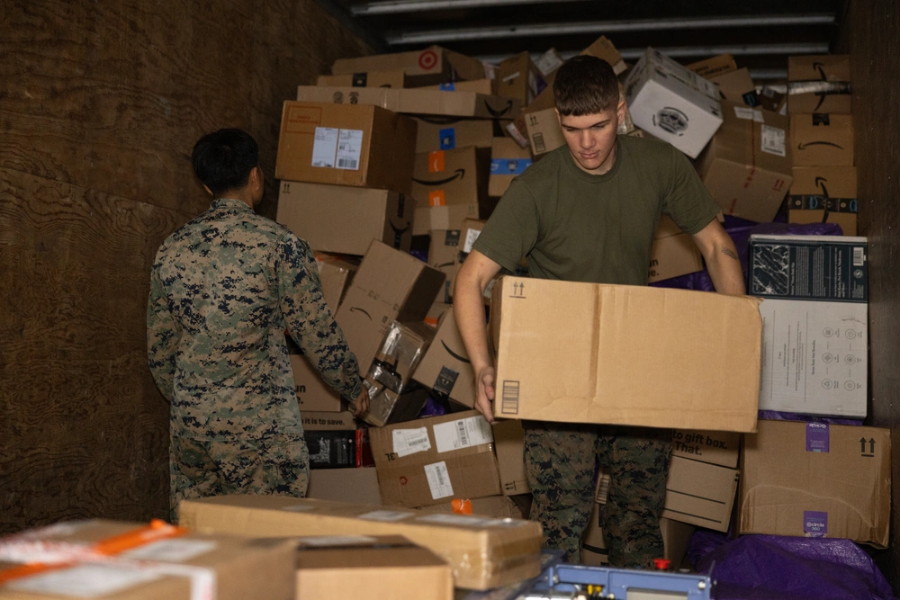 MCIPAC’s Santa Claus: MCIPAC Postal distributes mail through the holidays